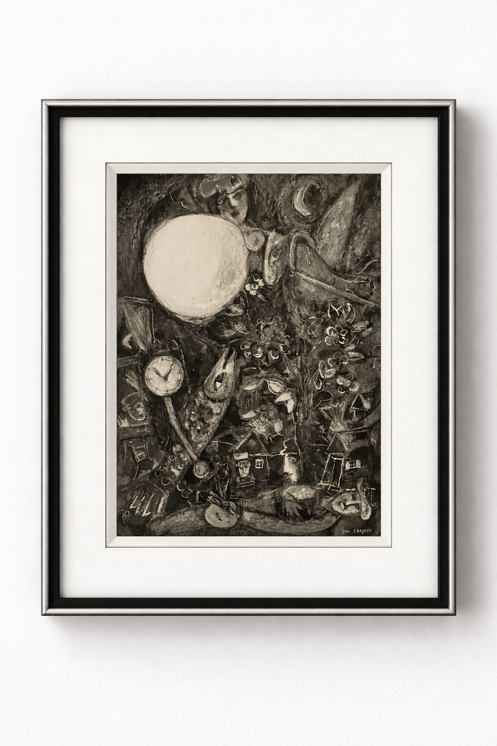 Framed black and white artwork with abstract design on a white wall